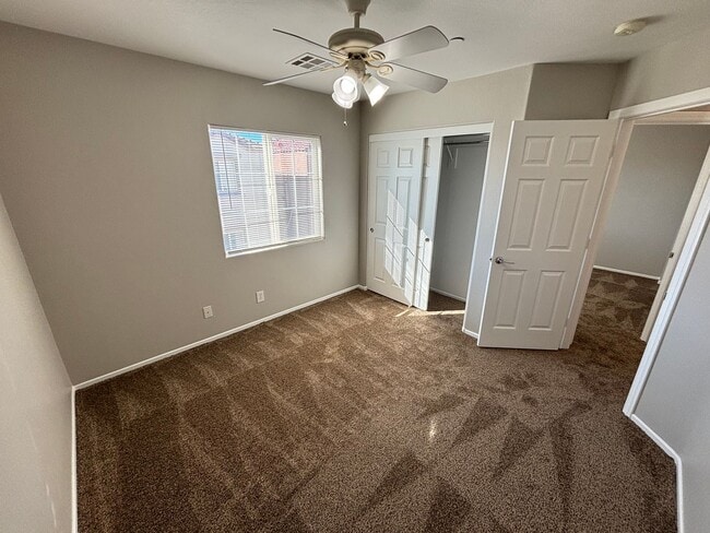 Building Photo - Spacious Tri-Level 4-Bedroom Home with Bal...