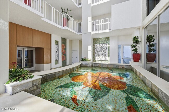 Building Photo - 6361 Pelican Bay Blvd