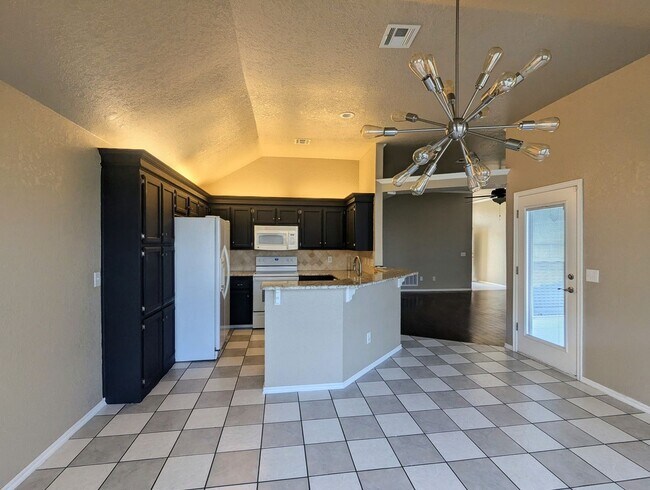 Building Photo - Beautiful 3 Bedroom Home with Study, Fireplace & Fenced Backyard!