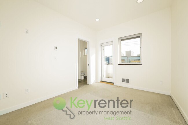 Building Photo - **Rent Special** Modern Two Bedroom Townhome with Designated Parking