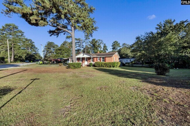 Building Photo - 1709 Woodfield Dr