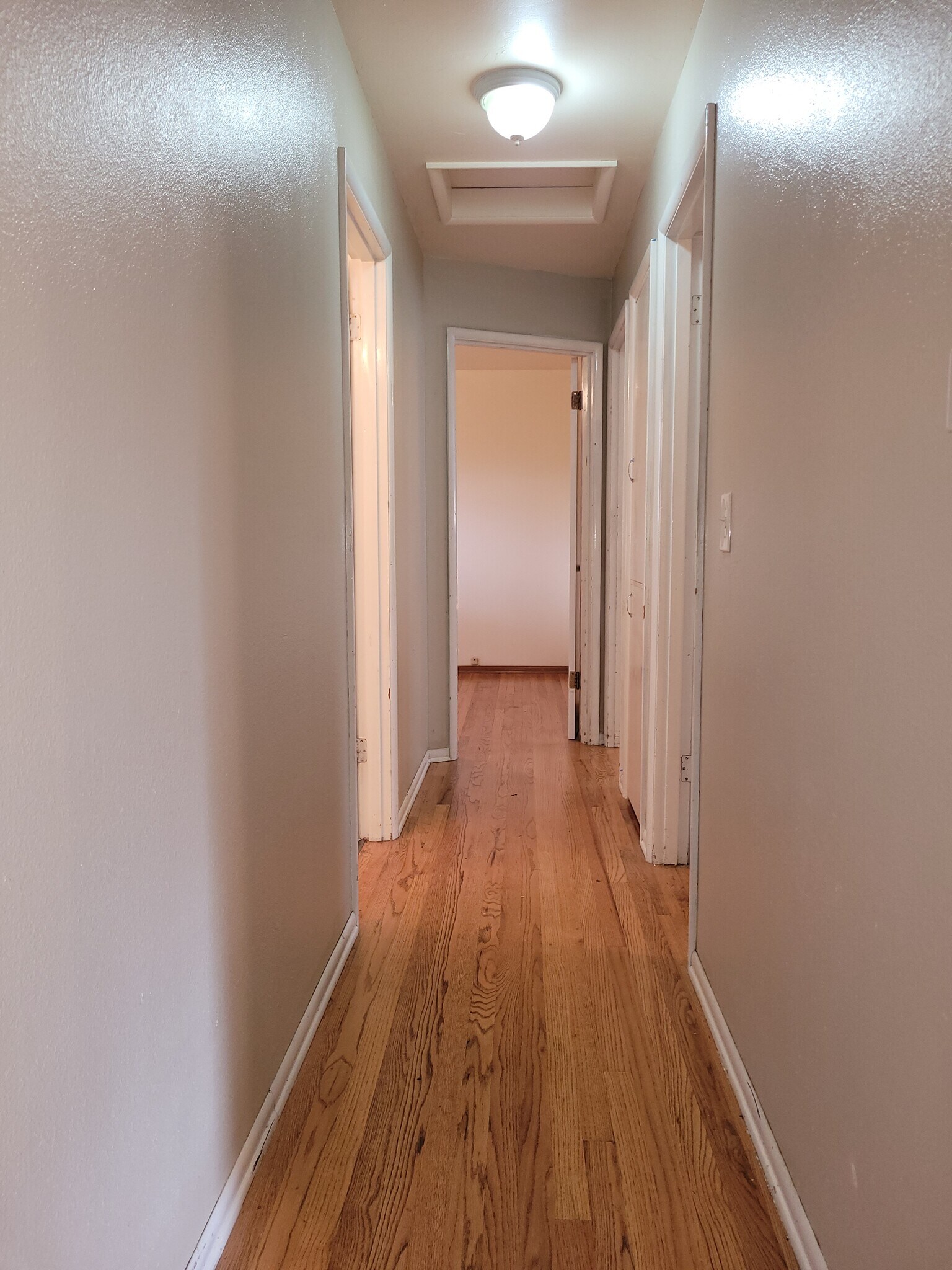 FRONT HALLWAY. FRONT OF HOUSE HAS REAL HARDWOOD FLOORS - 5955 SW 179th Ave