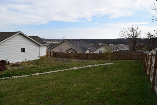 Building Photo - Located in the popular Woodland Hills Subd...