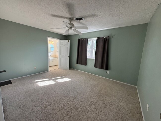 Building Photo - 4 Bed Brick Home! Zia School District! - P...