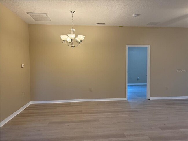 Building Photo - 8210 Whistling Pine Way