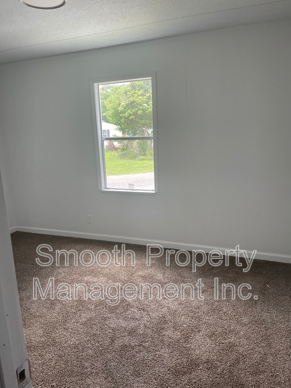 Building Photo - 7809 Marlette Dr