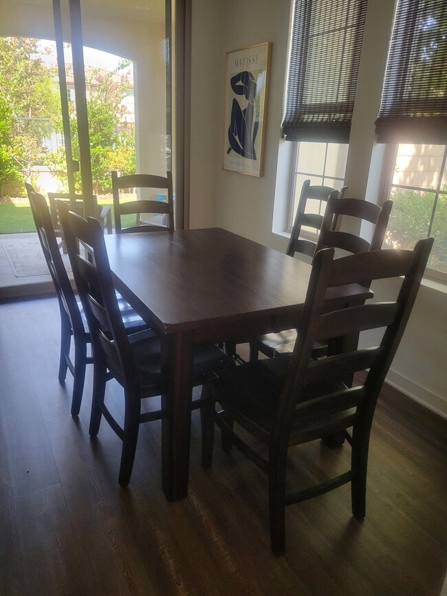 Dining area with sliding glassw doors to patio/backyard - 63 Finch