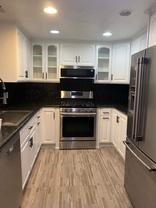 Building Photo - 9601 Woodman Ave