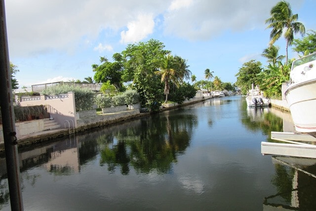 Building Photo - AVAILABLE NOW!! Furnished 2 bed/2 bath Home with Pool and on Canal