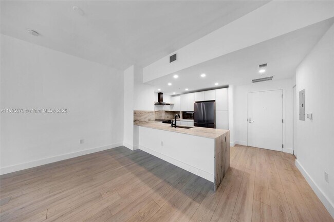 Building Photo - 7901 Hispanola Ave