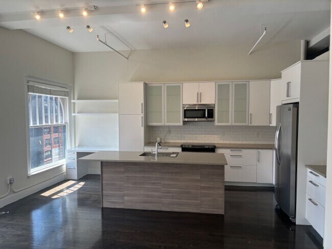 Building Photo - Charming 1bd/1ba Condo – Denver Dry Goods ...