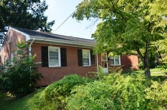 Building Photo - 3 BR/ 1 BA Lakeside Three bedroom with large fenced yard and detached garage/workshop