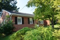 Building Photo - 3 BR/ 1 BA Lakeside Three bedroom with large fenced yard and detached garage/workshop