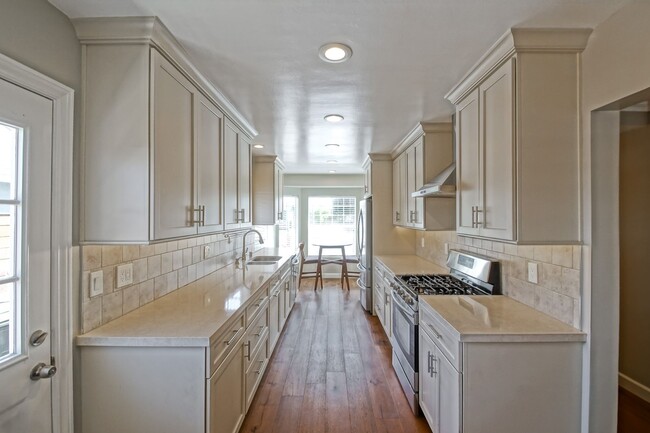 Building Photo - REMODELED, BRIGHT & AIRY, 4BR3BA HOME W/ G...