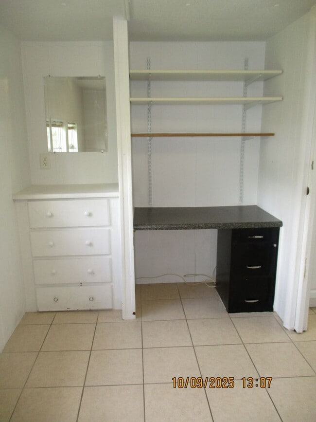 Building Photo - Welcome to this inviting 2-bedroom, 1-bath...