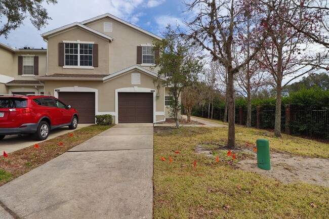 Building Photo - Town home 2 story, 3/2.5/1 backing up to T...