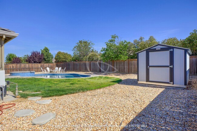 Building Photo - Practically New & Ready for Summer Fun!