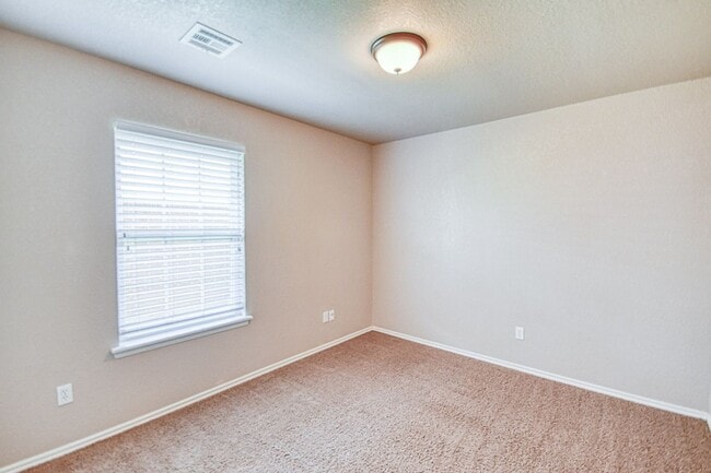 Building Photo - Beautiful three bedroom home with in-ground storm shelter!