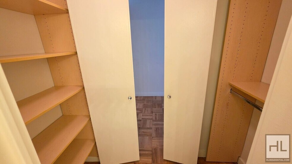 Building Photo - Bright Ninth-Floor Studio with Exceptional Closet Space near the UN