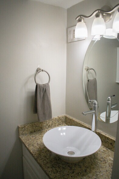 Half bathroom on main level - 6980 Roswell Rd