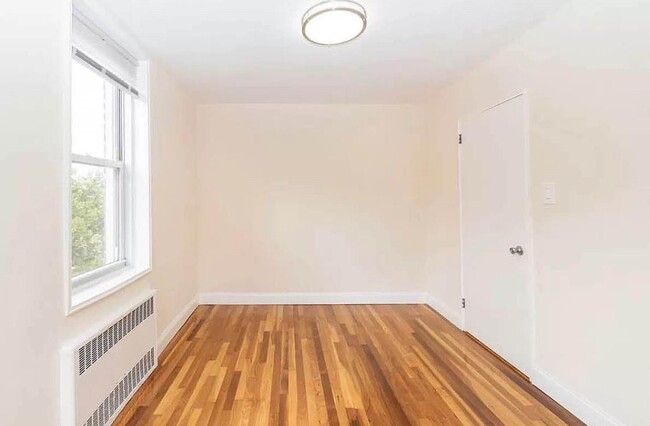 Building Photo - 55-05 Woodside Ave