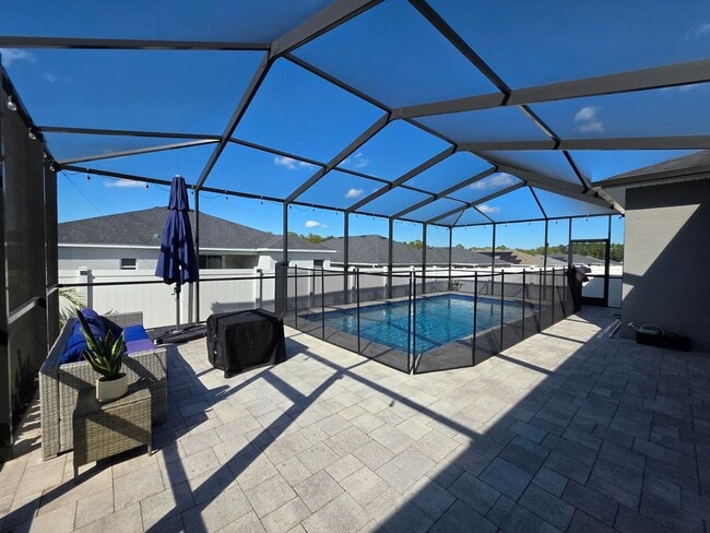 Building Photo - GORGEOUS 4-Bedroom, 3-Bathroom Pool Home, ...