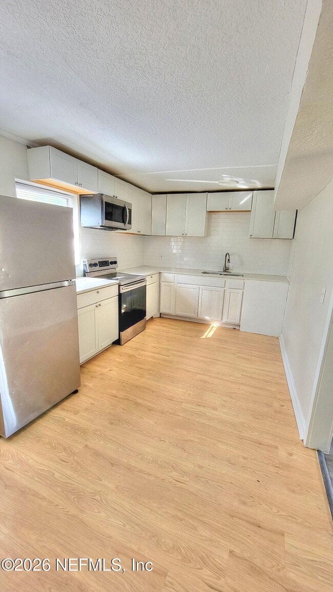 Building Photo - 9172 11th Ave