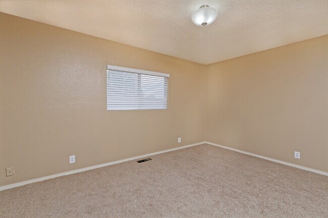 Building Photo - I-40 freeway access nearby. Couple blocks ...