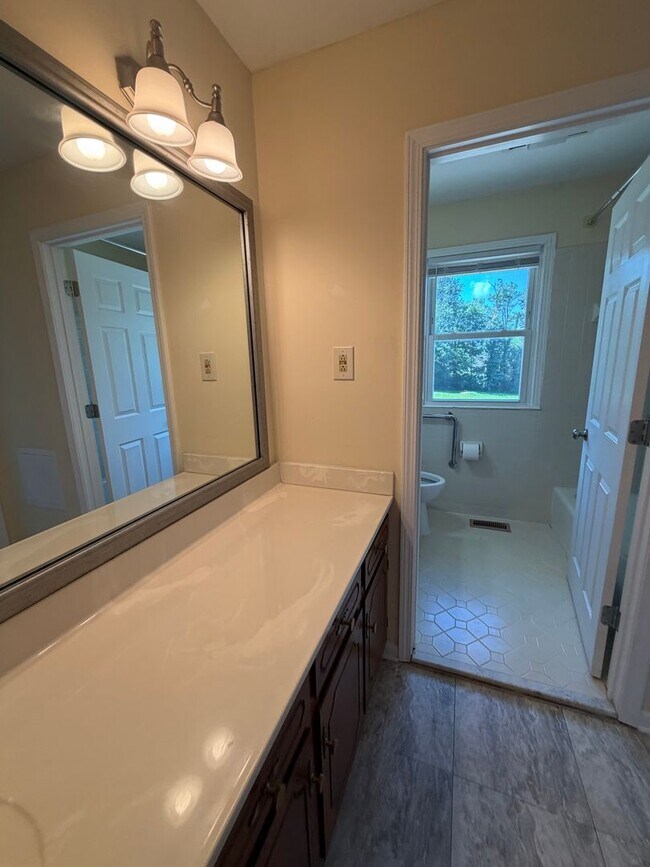 Building Photo - Situated in the heart of Sango, massive lot, and includes a fully finished & recently remodeled b...