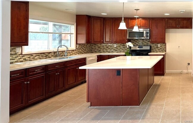 Building Photo - 7208 Enfield Ave