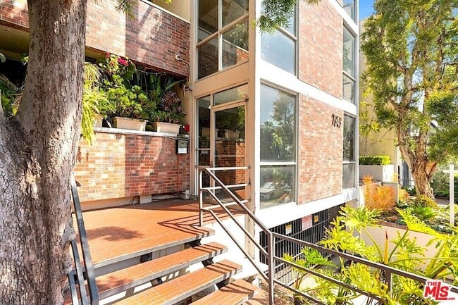 Building Photo - 7949 Selma Ave