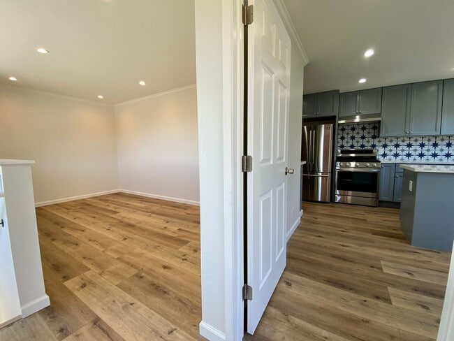 Building Photo - Remodeled 3BR, 2BA with Orchard, Garage & ...