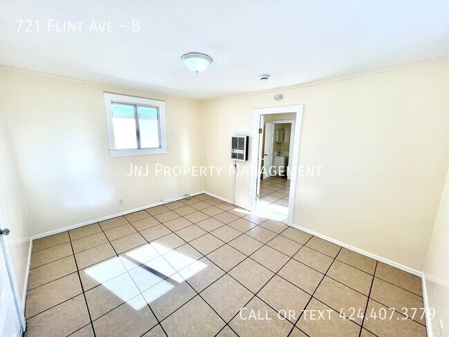 Building Photo - 721 N Flint Ave