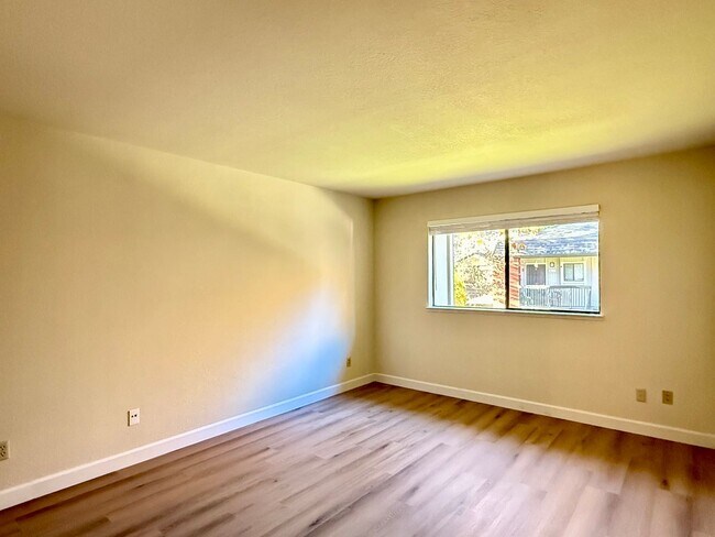 Building Photo - New Vinyl Plank Flooring, Fresh Interior Paint, 1 Car Garage + 1 Assigned Outdoor Parking Space -...