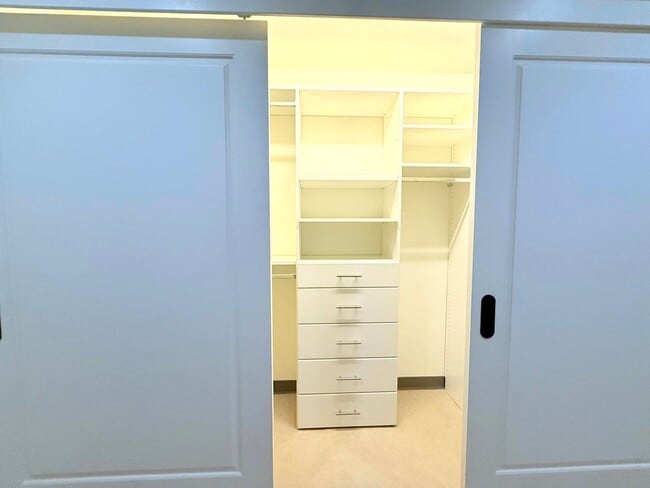 Building Photo - ***MOVE-IN SPECIAL ONE MONTH FREE RENT***Very Unique Spacious Two Bedroom - Two bath luxury Condo...