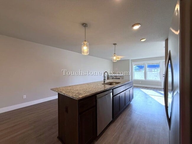 Building Photo - Modern Open Concept 3 Bedroom Home with Balcony and Attached Garage