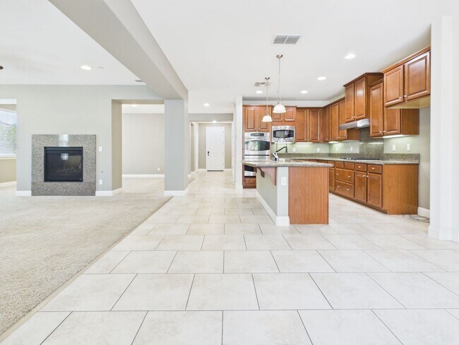 Building Photo - Spacious 5-Bedroom Solar Home in Blackstone with Resort Style Amenities