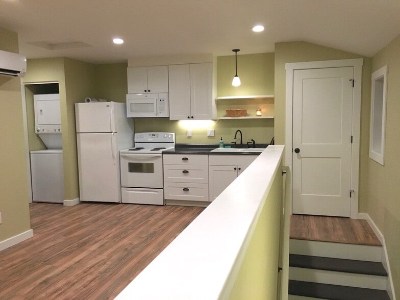 The washer / dryer combo unit is full sized. - 9235 SW 7th Ave