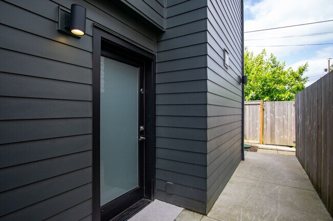 Building Photo - Stylish + Modern Corner 2-Bedroom Townhouse!
