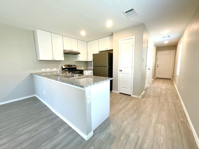 Building Photo - *MOVE IN SPECIAL* Modern Two-Story Home with Garage & Fenced Yard!