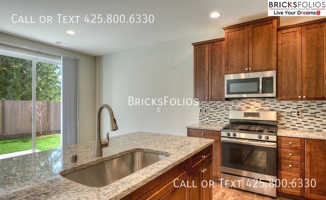 Building Photo - Your Puyallup Dream Home is Here – Open Layout, amazing Kitchen & More
