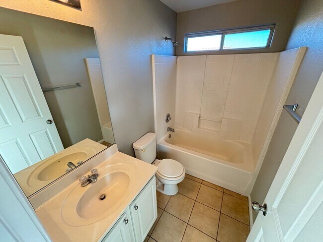 Building Photo - Beautiful Trilevel 3 Bed/3bath/2 car home located in Northwest Las Vegas. Make the Move for Less:...