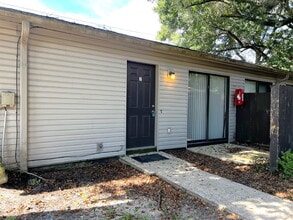 Building Photo - Updated 2BR, 1BA Apartment Off Old Palafox Hwy with LVP Flooring Throughout, Vaulted Ceilings & W...