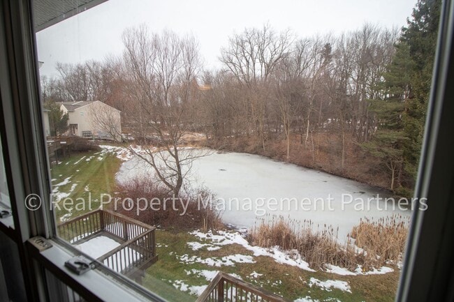 Building Photo - Forest Hills 3 Bed Townhome with Garage, Pond View and Some Utilities Included