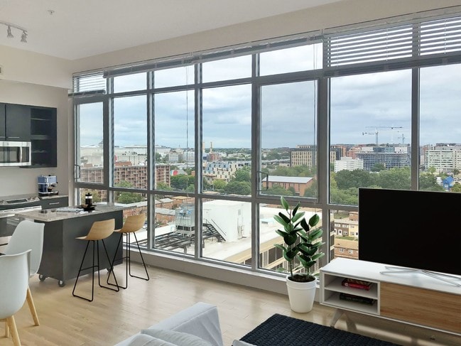 Kitchen and living area at Leo - Leo at Waterfront