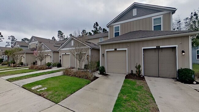 Building Photo - Jacksonville Townhome w/ Garage, Spacious Bedrooms & In-Unit Washer/Dryer