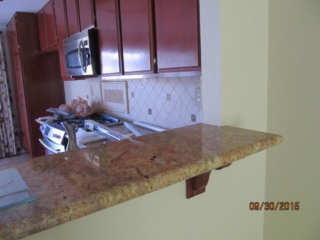 Building Photo - LOVELY 2 BR/1.5 BATH, 2 STORY CONDO WITH GARAGE
