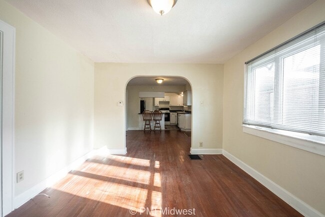 Building Photo - "Charming 2-Bed Home with Gleaming Hardwoo...