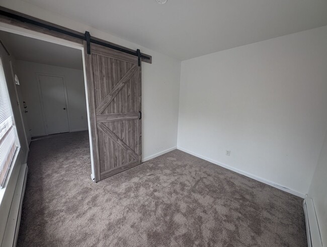 Building Photo - Cute and Cozy, Centrally Located Triplex with Yard