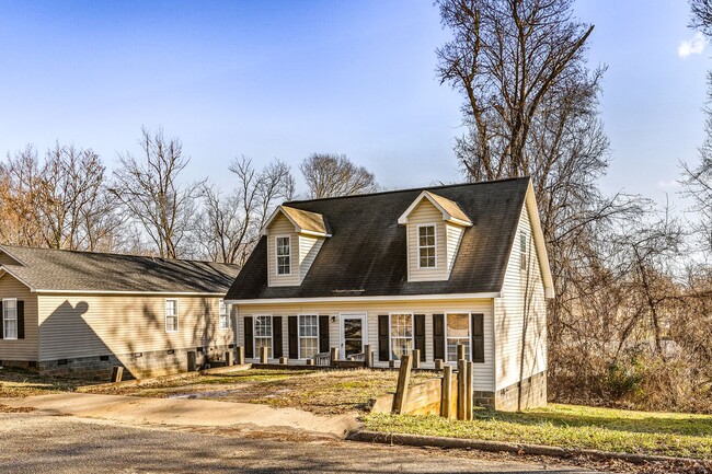 Building Photo - Updated Home, Wood Like flooring, New Carp...